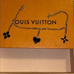 Louis Vuitton Silver Charm Bracelet.